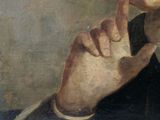 portrait of a young man with a finger on his lips