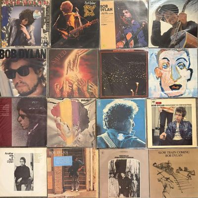 a lot of records on the wall of a room