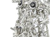 a sculpture of a man made out of many pieces of metal