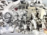 several black and white photographs of native people on a table