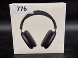an image of a pair of headphones sitting on top of a box