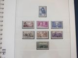 an open book with a bunch of different stamps on it