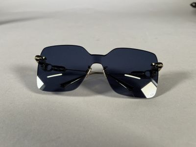 a close up of a pair of sunglasses on a table