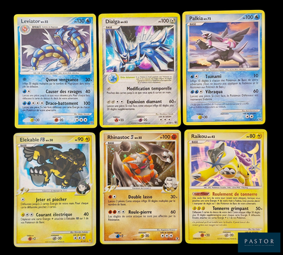 Plusieurs cartes Pokémon sont représentées sur un fond noir