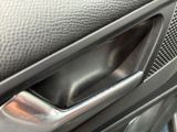 a close up of the door handle of a car