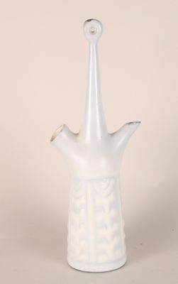 an image of a white vase on a table