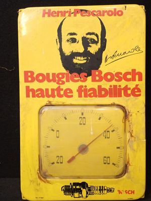 une boîte jaune sur laquelle figure l'image d'un homme barbu tenant un thermomètre