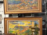 de nombreux tableaux exposés dans une pièce où se trouve une horloge posée sur la table