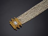 un collier de perles de culture et de diamants, signé Cartier