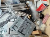 a wooden box filled with assorted items on a table