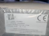 a label on the back of a box that is sitting on a table