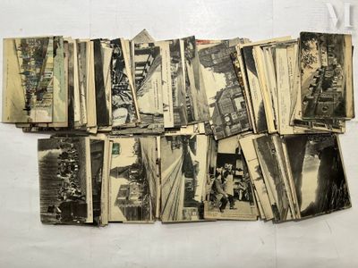a lot of old photographs on the table