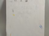 a close up of a piece of paper with writing on it