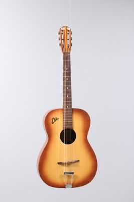 a close up of a guitar on a white background