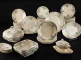 a picture of a group of dinner plates and bowls