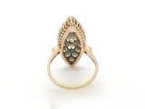 an image of a gold ring with diamonds on it