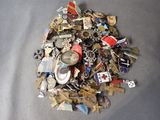 a pile of assorted metal items on a table