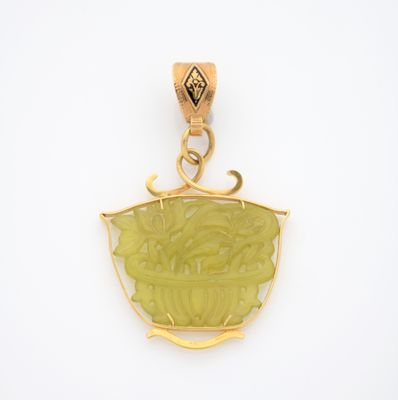 une image représentant un pendentif sur lequel est posé un bol de nourriture