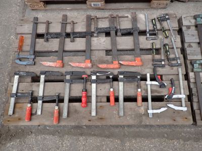 a lot of tools that are laying out on a pallet