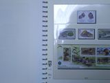a picture of a picture of a book with stamps on it