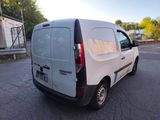 a white van that is parked in the parking lot