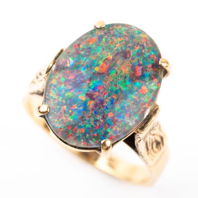 a close up of a ring with an oplite in it