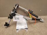 an image of a tripod with a stick attached to it
