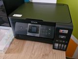 a printer that is sitting on top of a desk