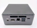 an image of a small computer with two usb ports on top of it