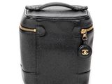 a close up of a black bag with a zipper on it