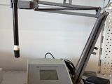 an image of a table with a clock and a radio
