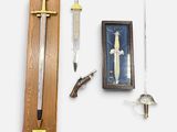 a picture of a sword, a knife, and a picture of a fish
