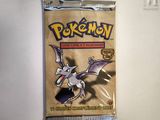 the back of a bag of pokemon trading cards on a table