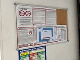 a picture of a bulletin board with various signs on it