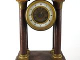 a clock that is sitting on top of a table