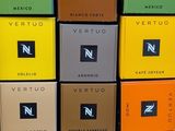 many boxes of coffee that are stacked on top of each other