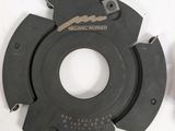four different types of circular cutters on a white surface