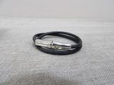 black leather bracelet with a silver clasp and a silver clasp