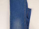 a pair of blue jeans on a white background