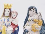 two figurines of the virgin and child with a crown on their heads