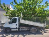 a white truck that is parked on the street