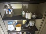a shelf that has a lot of items on it