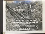 a black and white photo of a poster on a wall