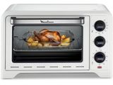 an image of a white toaster oven with a turkey in it