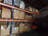 many boxes on the shelves in the warehouse
