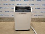 a small air conditioner sitting on the floor