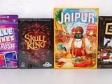 four different kinds of games on display on a table