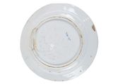 a white plate with a blue design on it