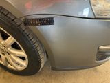 a close up of a car with a sticker on the side of it