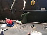 a picture of a workbench in a garage with tools on it